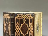 a small box with a decorative design on it