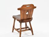 a wooden chair with a wooden seat on a white background