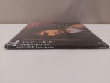 a picture of a book on a table with a blurry background