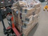 a large stack of boxes on a pallet in a warehouse