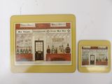 two coasters that have a picture of a store front