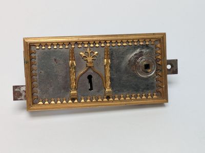 an old brass door handle with a keyhole and a lock