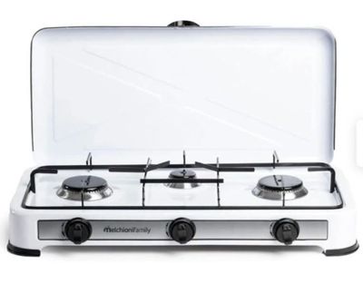a white stove top with two burners on it