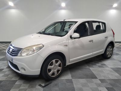 a picture of a white car parked in a garage