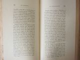 an open book that is sitting on a table