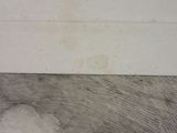 a black and white drawing of a wave in the water