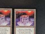 these are two cards with a picture of a mountain in the background