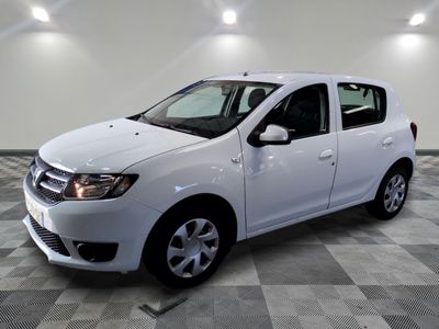 a picture of a white car parked in a garage