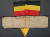 an old german flag and a german flag on a table
