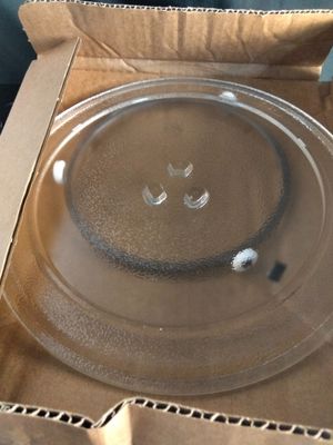 une boîte en carton contenant une plaque de verre