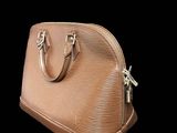 an image of a handbag made out of leather