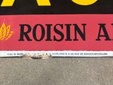 a close up of a sign on the ground