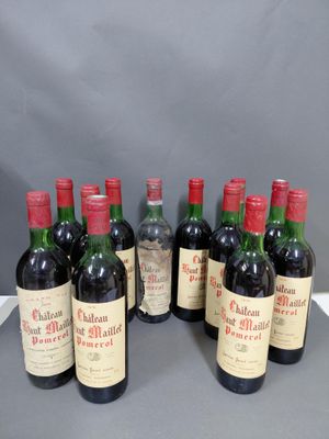 six bouteilles de vin rouge sont alignées sur une table