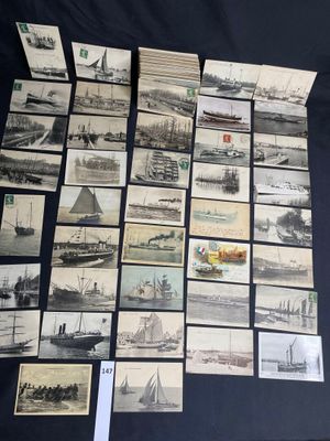 a lot of old photos of ships on the table