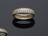 three diamond set rings and a diamond set ring