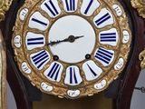 a clock that is sitting on top of a table
