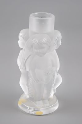 vase en verre transparent avec un ours dessiné au fond et un socle jaune