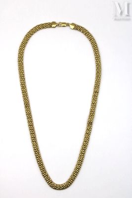 a gold chain necklace with a clasp on a white background