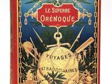 un vieux livre à la couverture rouge ornée de dorures