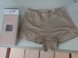 a pair of underwear sitting on a table next to a box