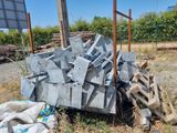 a pile of concrete blocks sitting on the ground
