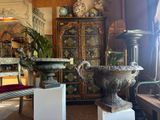 a room with a lot of antique items in it