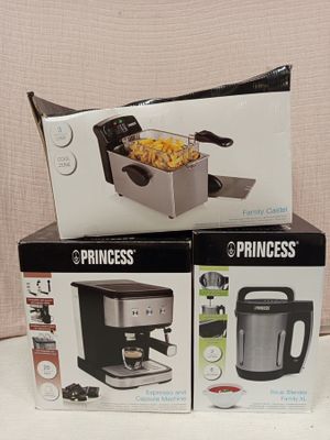 three boxes of food sitting on top of each other on a table