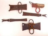 several different types of weapons are displayed on a white surface