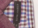 purple and blue checkered dress shirt with a black label on the chest