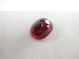 a red diamond on a white surface