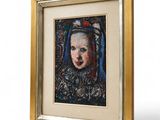 a painting of a woman with a blue headdress in a gold frame