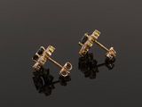 a pair of sapphire and diamond stud earrings