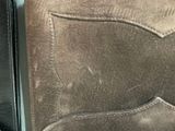 a close up of a wallet on a table