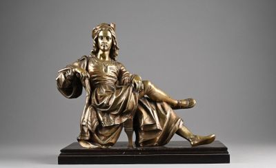 an image of a bronze statue of a woman holding a child
