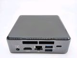 a small computer that is sitting on top of a table