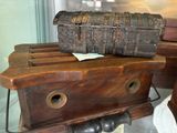 a wooden box on top of a wooden box on a table