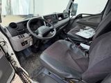 the interior of a truck with the driver ' s seat up