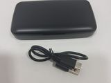 a black case with a usb cable attached to it
