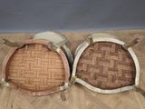 two chairs that are sitting on a wooden floor