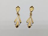 a pair of gold and diamond earrings