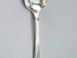 a spoon that is sitting on a table