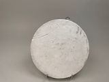 a white plate that is sitting on a table