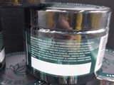 several jars of hemp oil are stacked on top of each other