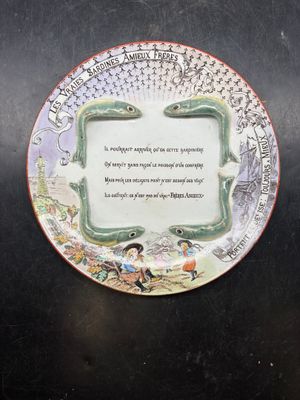 a plate with a poem on it on a table