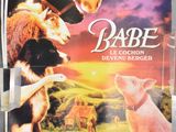 the poster for the movie babe is hanging on the wall