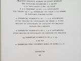 an open book with a black and white image of a clock on it