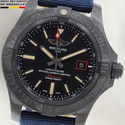 the watch is black and has a blue strap around the strap