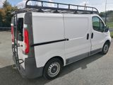 a white van that is parked in a parking lot