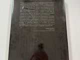 the back cover of a book with a picture of a man sitting on a motorcycle