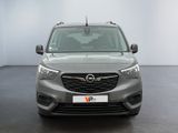 the front view of a grey opel parked in a room